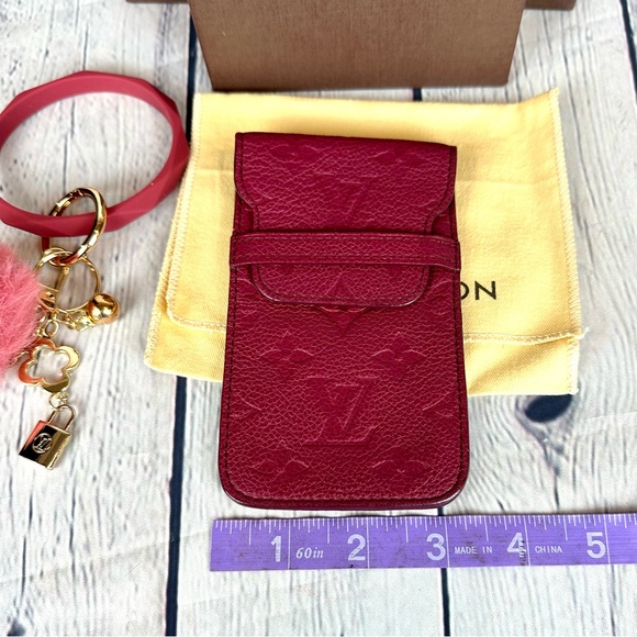 Louis Vuitton empreinte Monogram leather wristlet pouch with keychain - Picture 12 of 14